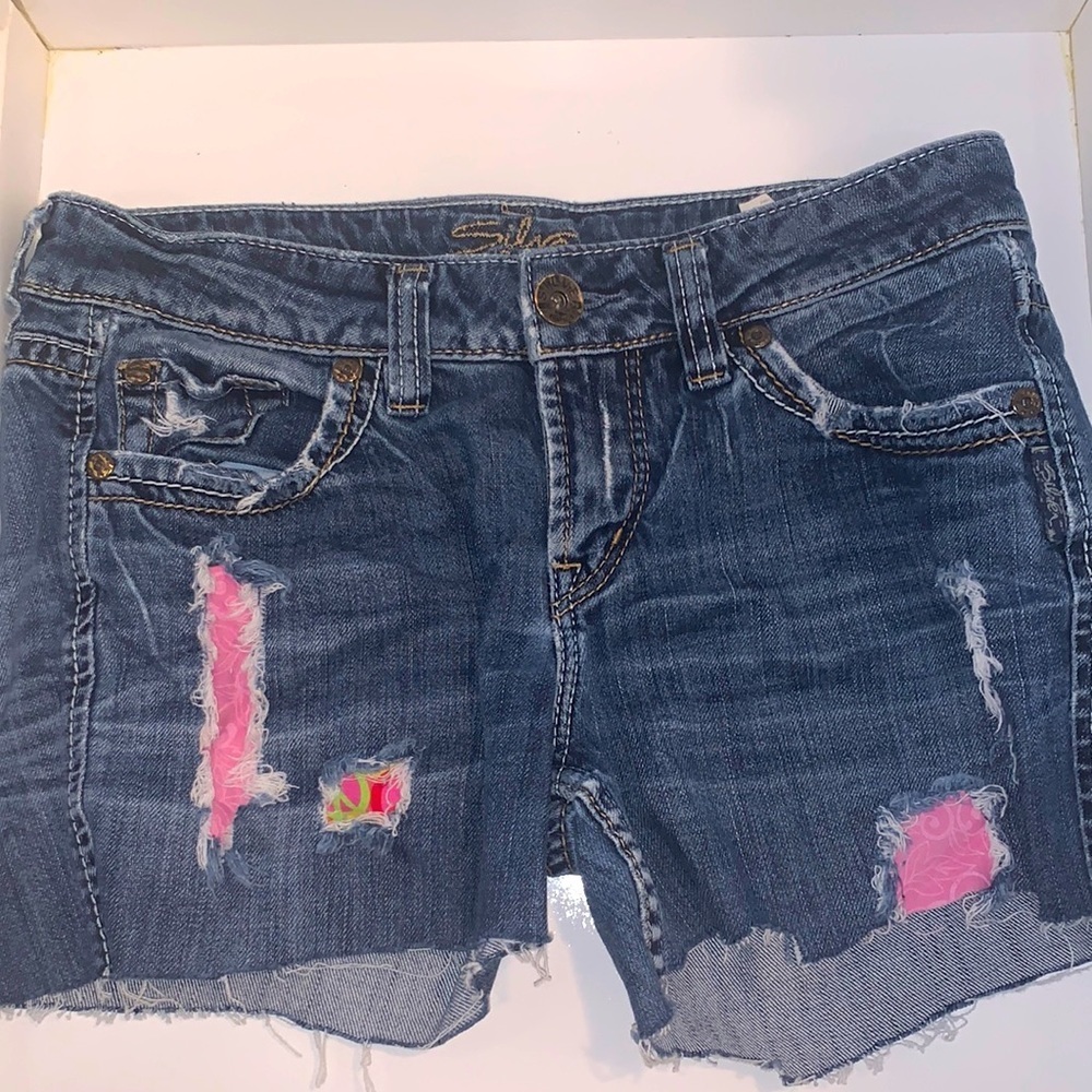 Silver distressed cut off jean shorts size 28